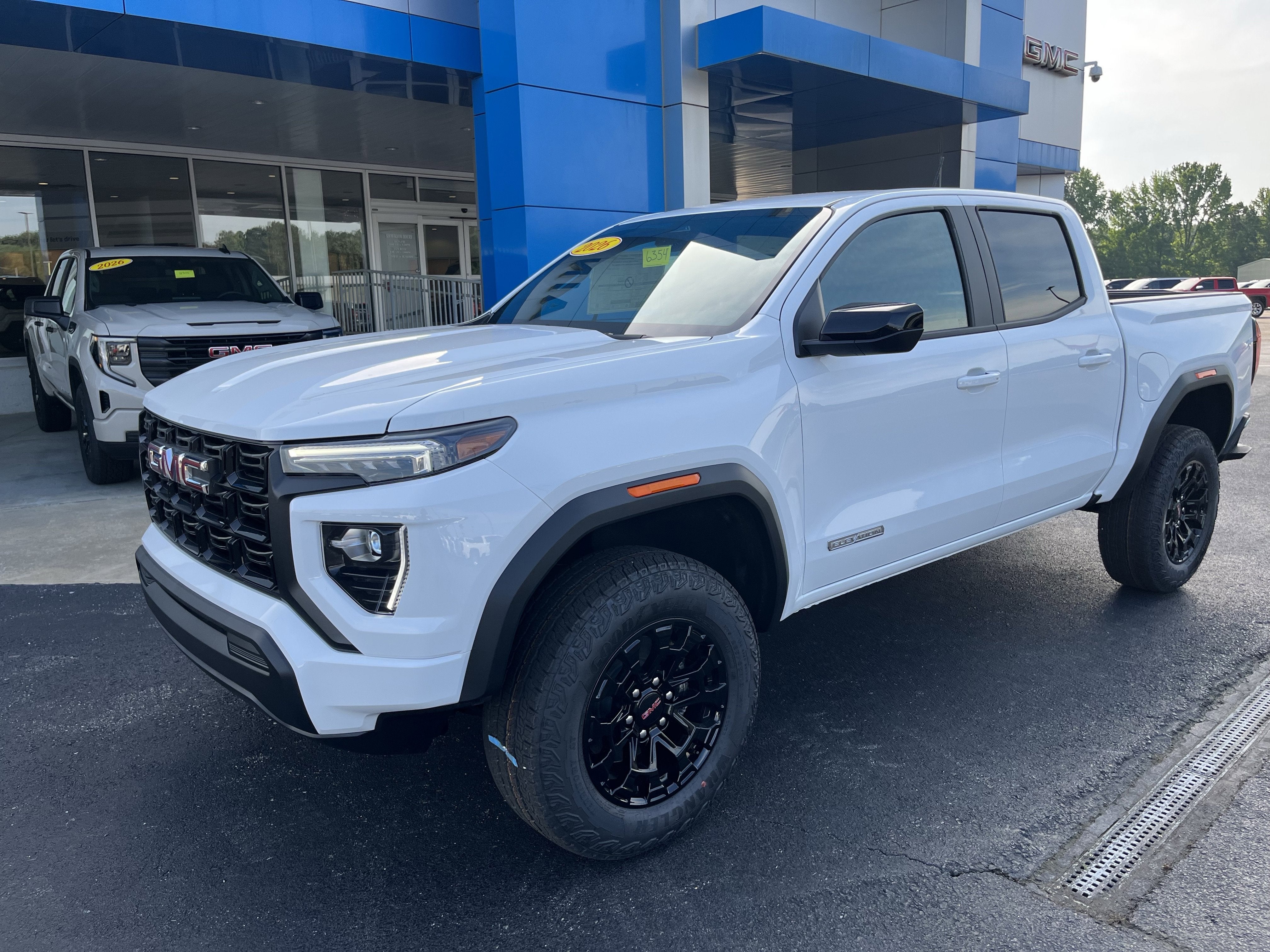 2026 GMC Canyon Elevation in Summit White — front three-quarter view