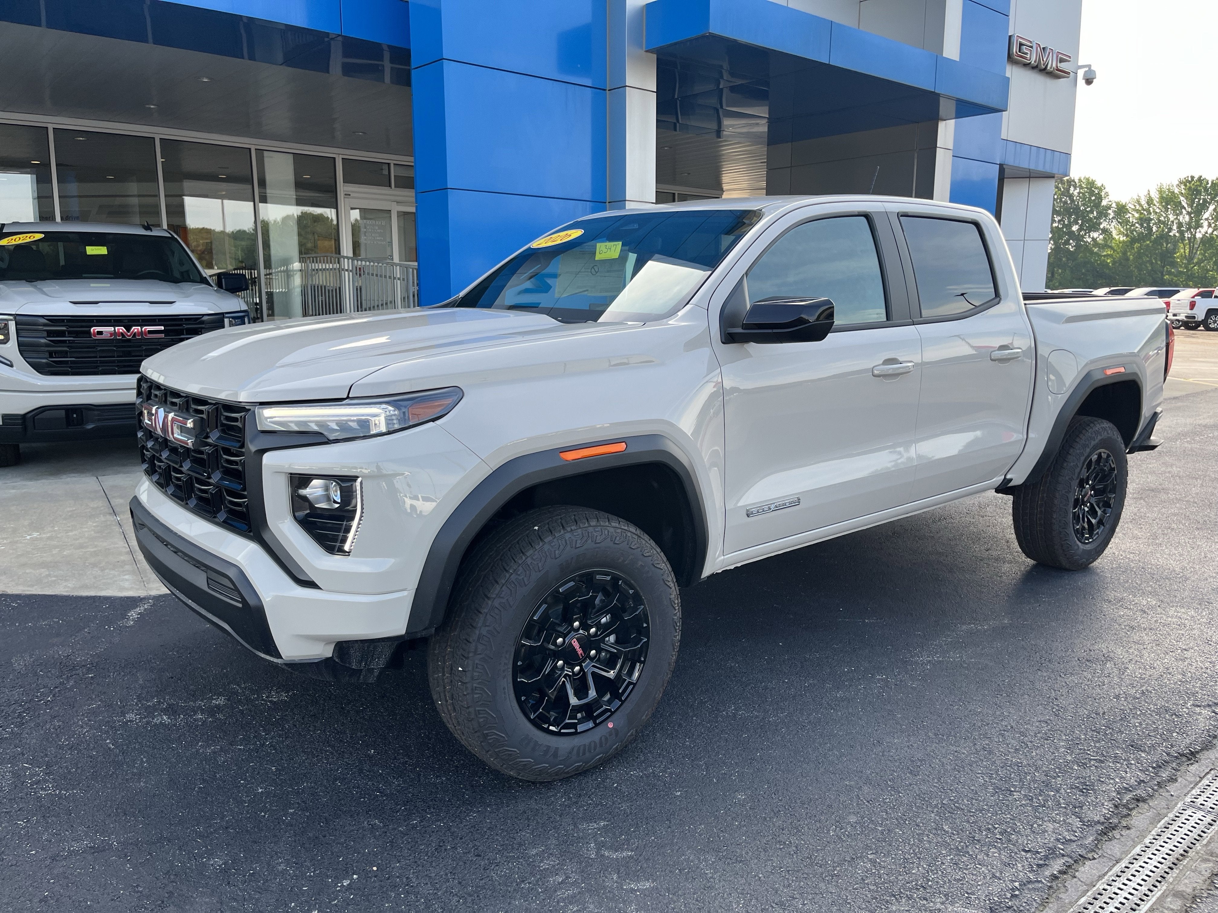 2026 GMC Canyon Elevation in Coastal Dune — front three-quarter view