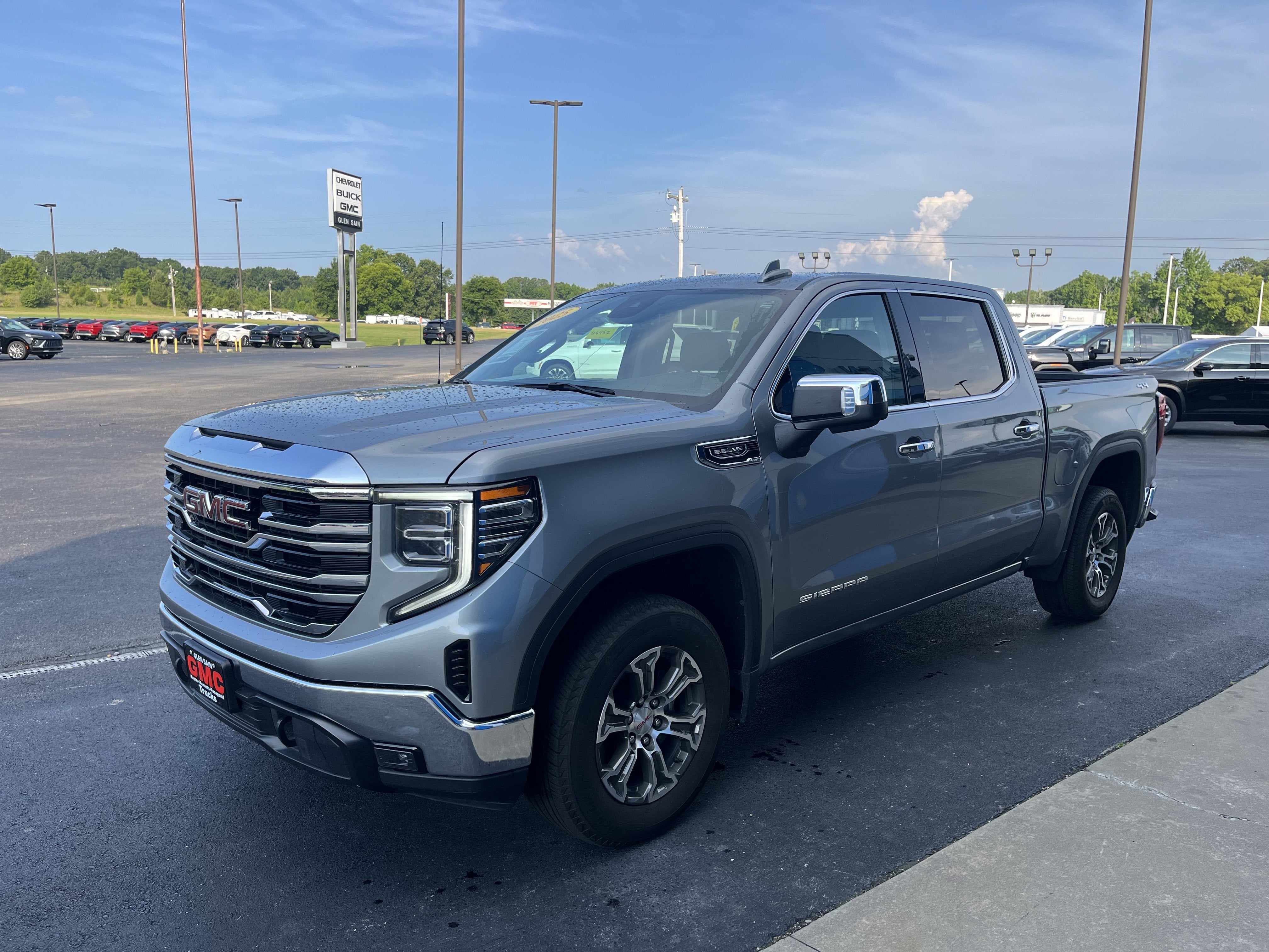 2025 GMC Sierra 1500 SLT in Sterling Metallic — front three-quarter view