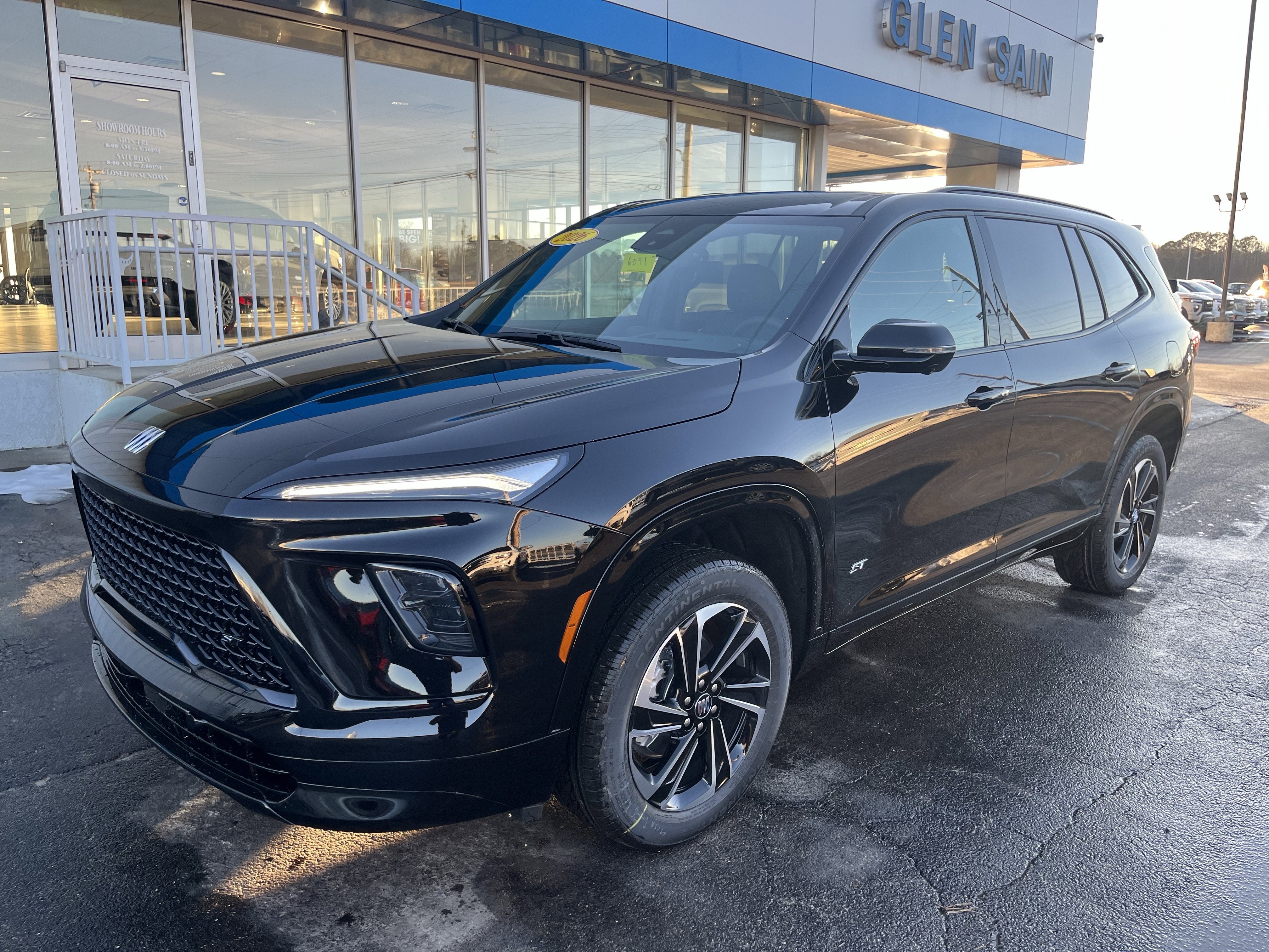 2026 Buick Enclave Sport Touring in Ebony Twilight Metallic — front three-quarter view