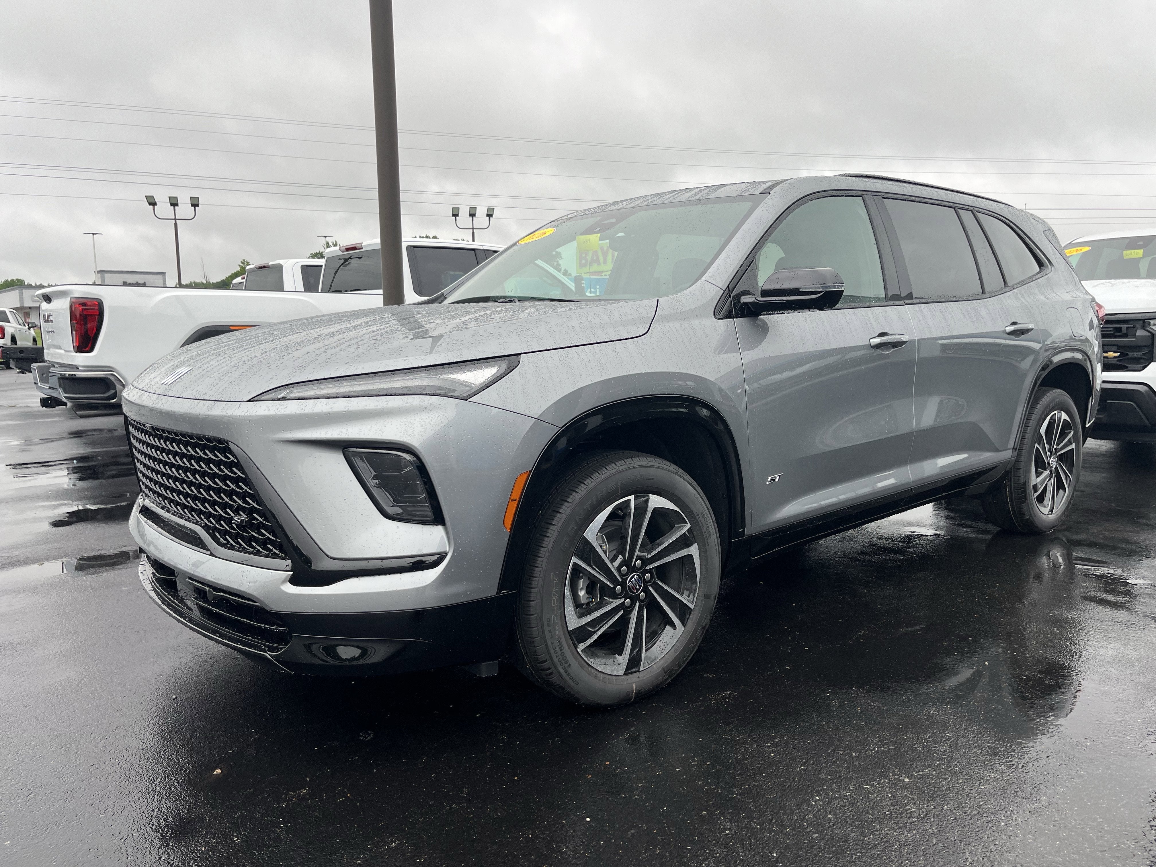 2026 Buick Enclave Sport Touring in Moonstone Gray Metallic — front three-quarter view
