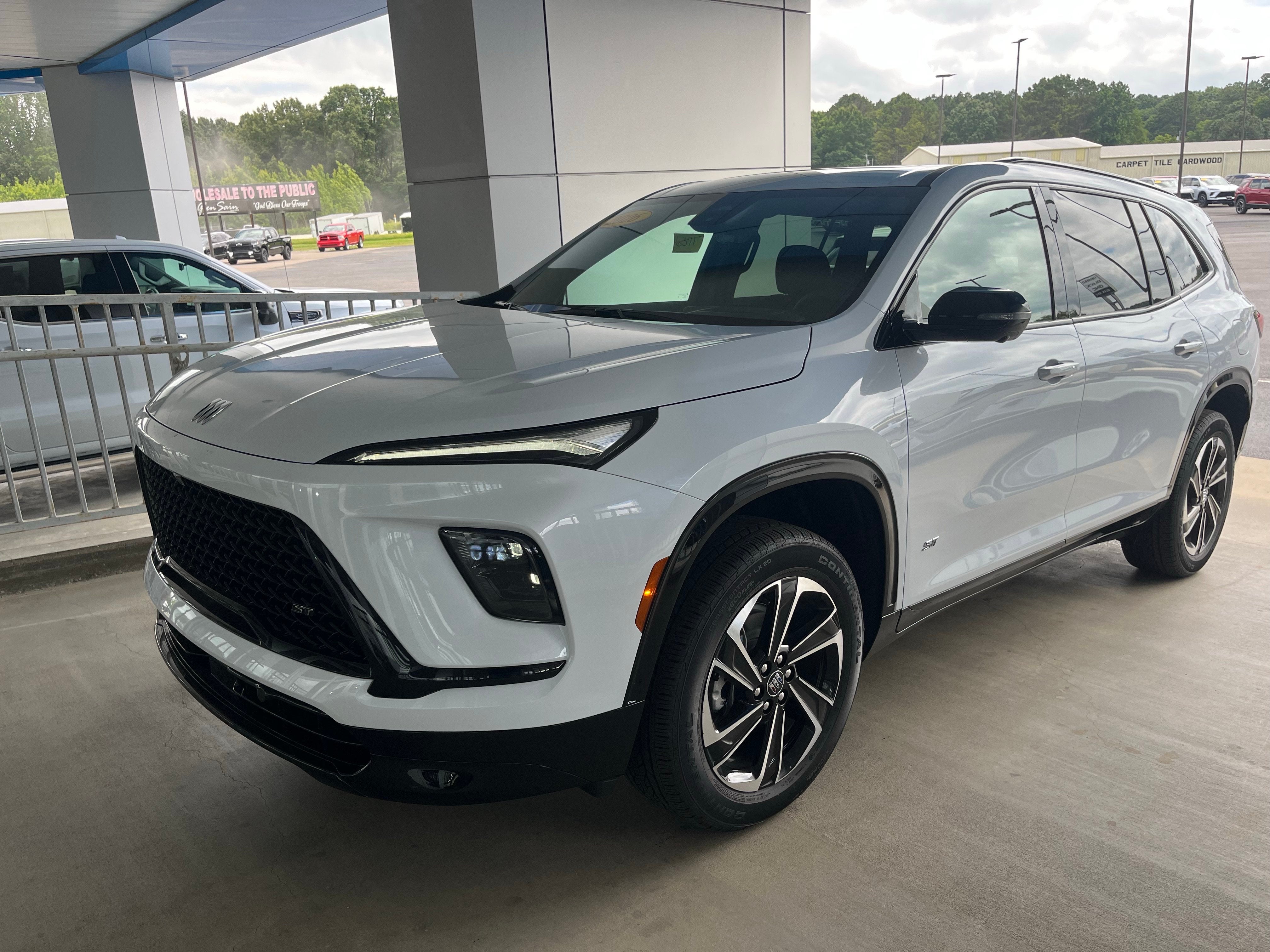 2026 Buick Enclave Sport Touring in Iridescent White Tricoat — front three-quarter view