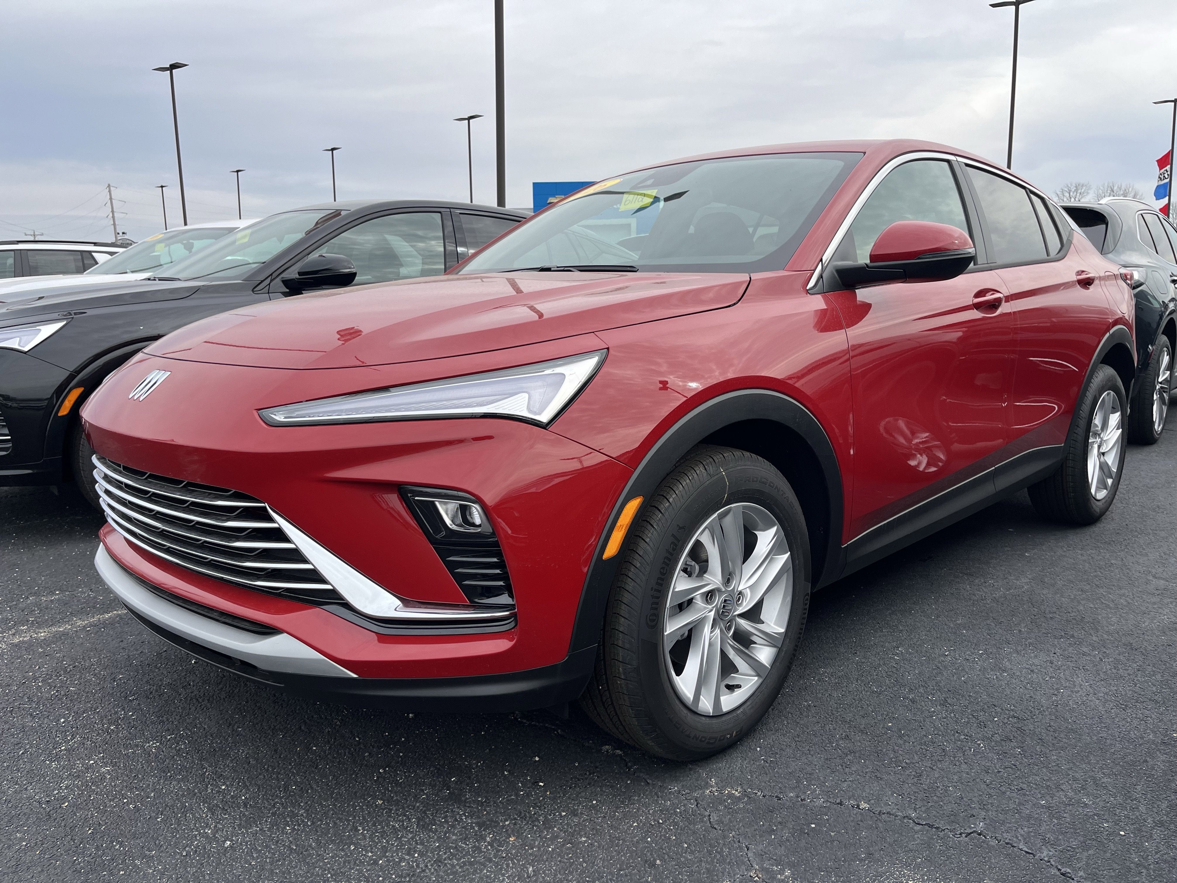 2026 Buick Envista Preferred in Brilliant Red — front three-quarter view