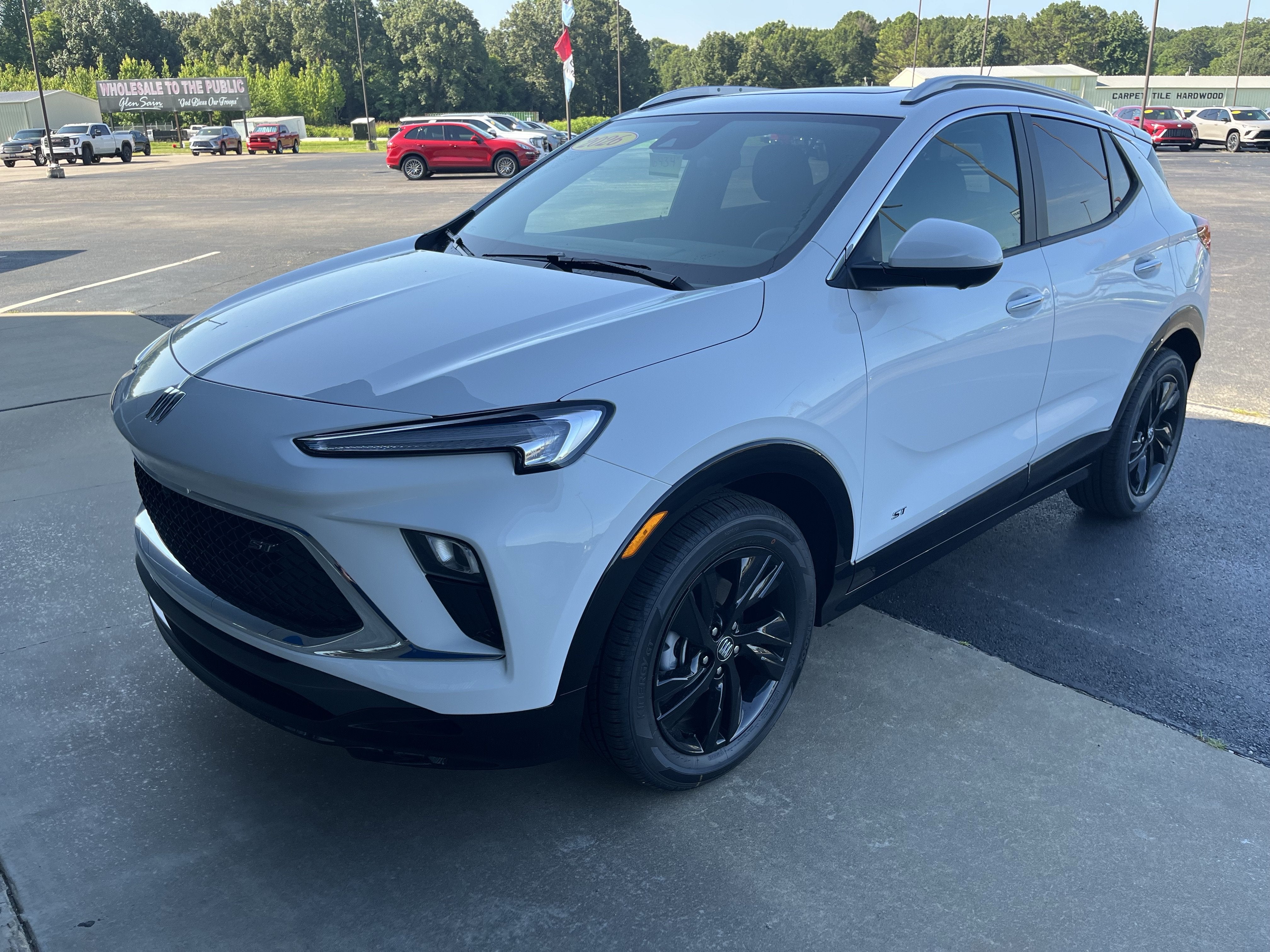 2026 Buick Encore GX Sport Touring in Summit White — front three-quarter view