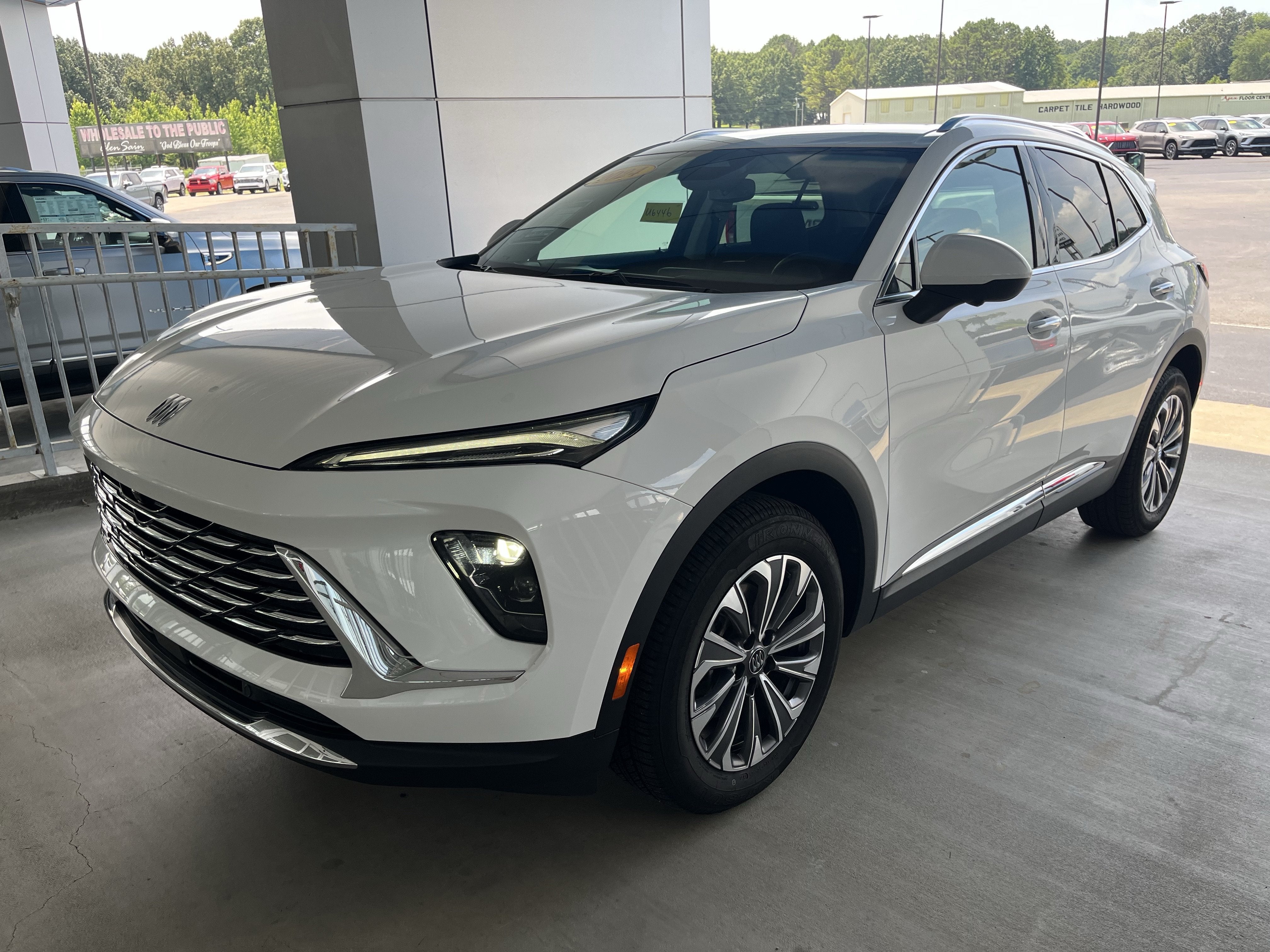 2024 Buick Envision Preferred in Summit White — front three-quarter view
