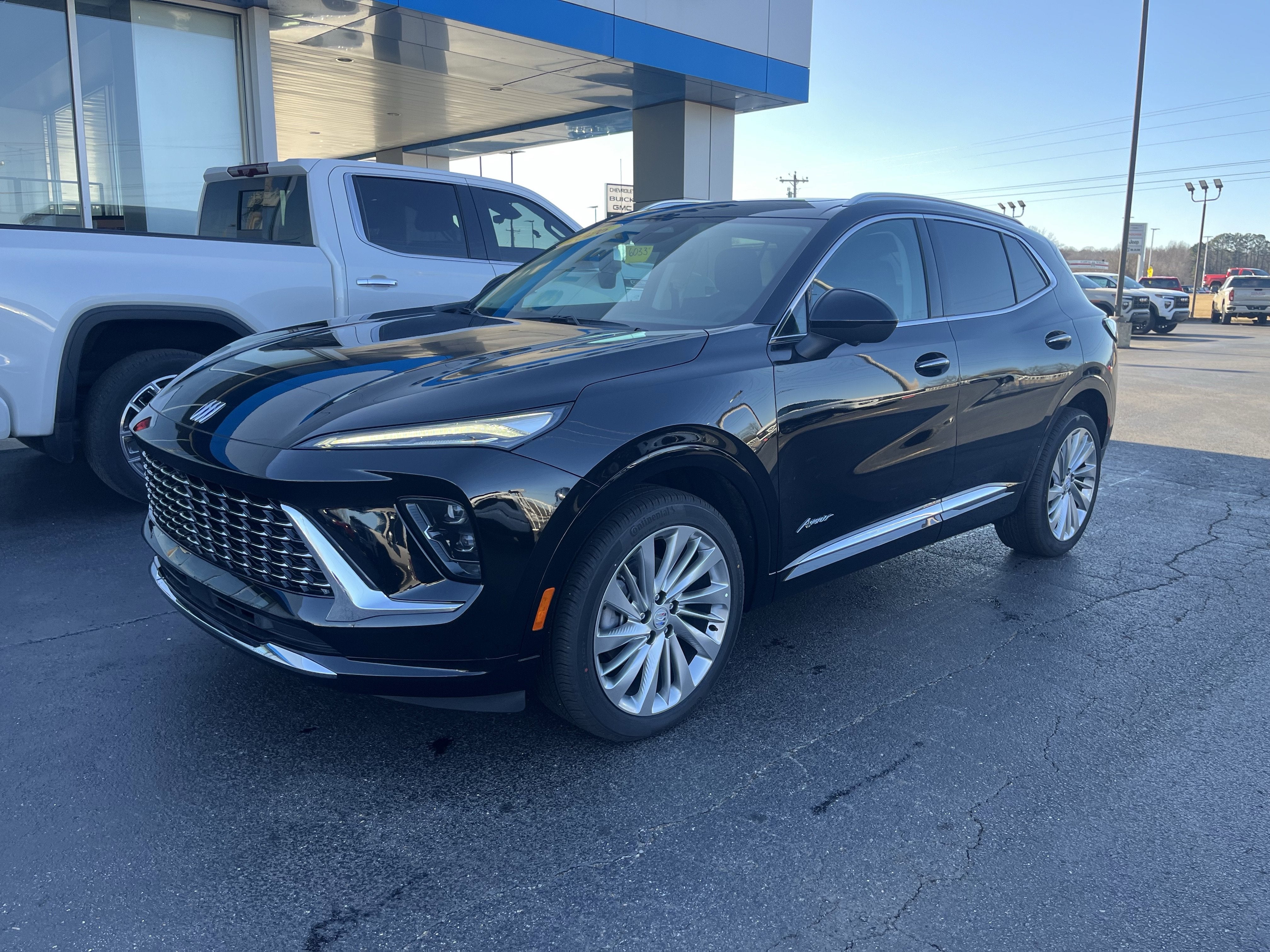 2026 Buick Envision Avenir in Ebony Twilight Metallic — front three-quarter view